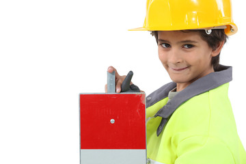 Child with yellow helmet