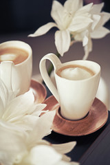 Porcelain cups of coffee