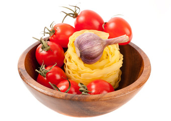Pasta and tomatoes in a bowl