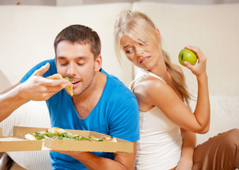 couple eating different food