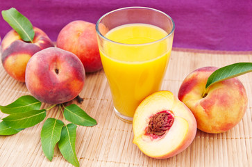 glass of juice with peaches