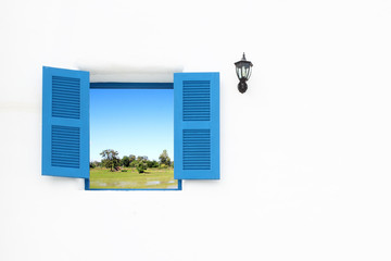 Greek Style windows and lamp with country filed