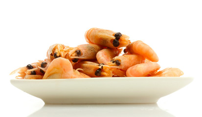Boiled shrimps on plate, isolated on white