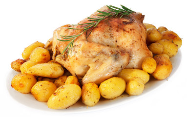 Delicious roast chicken with potatoes on white background