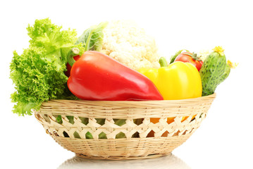 Fresh vegetables in basket isolated on white