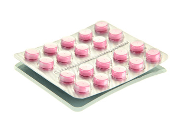 pills packed in blisters, isolated on white