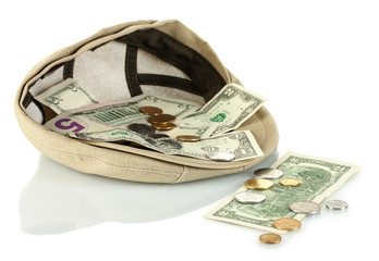 cap with money on a white background