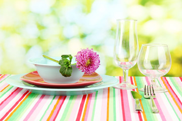 Table setting on bright background close-up