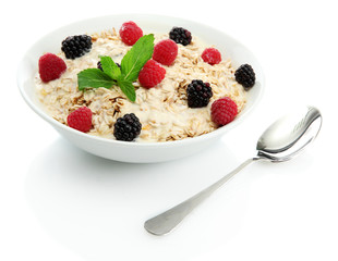 tasty oatmeal with berries, isolated on white