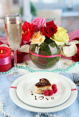 Table setting in honor of Valentine's Day on room background