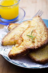 Nice breakfast: toast with rosemary and orange juice