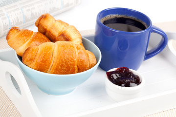 breakfast with croissant, jam and coffee