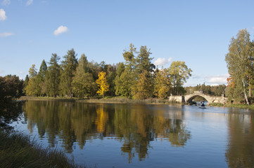 Fototapeta na wymiar Humpbacked (Gorbaty) bridge at White (Beloye) lake. Gatchina