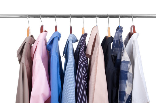 row  shirts  on hangers on a white background