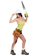 Sexy woman holding tools