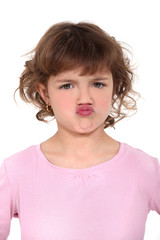 little girl pouting