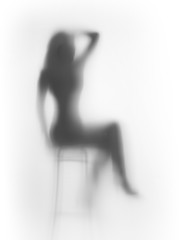 Diffuse sitting woman silhouette
