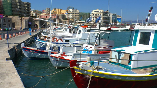 Boats in harbor near Venetian Fortress Koules, Heraklion, Crete