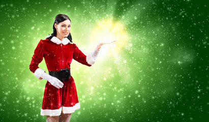 Portrait of girl wearing santa claus clothes