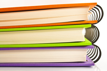 stack of ring binder book or notebook isolated on white