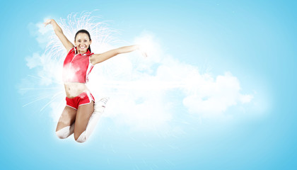 Young woman dancer. With lights effect.