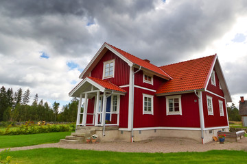 Traditional red Swedish cottage house