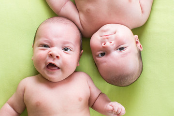 Adorable twins babies boys. Top view of children. © Oksana Kuzmina