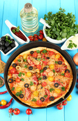 colorful composition of delicious pizza, vegetables and spices