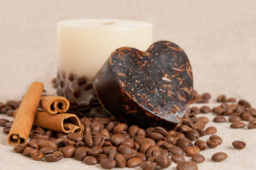 aroma handmade soap and candle with cinnamon sticks and coffee b