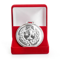 silver medal in red gift box.