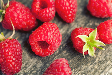 raspberries on wooden table