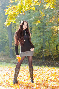 young woman in autumnal nature