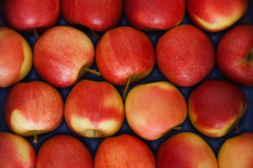 Lovely red apples packed neatly together perfect as a background