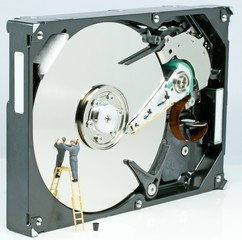 An open hard drive being cleaned PC data clean up concept
