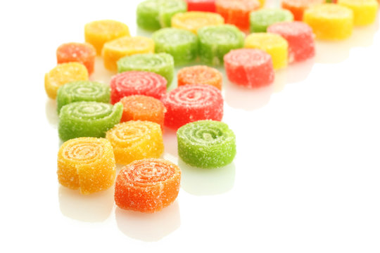 sweet jelly candies isolated on white.