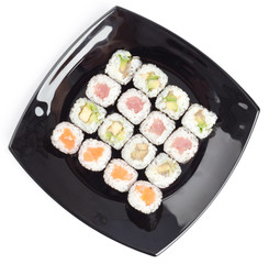 Black rectangle plate with sushi, isolated on white. Top view
