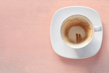 empty of cappuccino coffee in white cup
