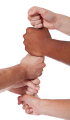 Diverse Personen setzen ihre H&auml;nde &uuml;bereinander