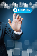hand of business women pushing a button a touch screen interface