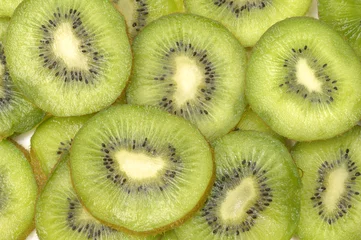 Crédence de cuisine en verre imprimé Tranches de fruits Bouchent les tranches de kiwi