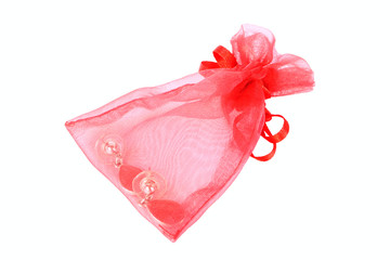 Red transparent packing for jewelry with earrings inside