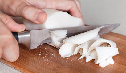 Salted white pork fat slicing