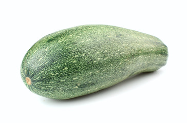 A green zucchini isolated