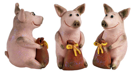 Toy pigs with a bags of money