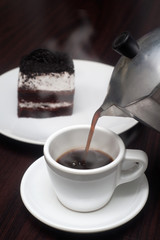 The perfect white cup with steaming coffee