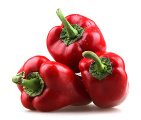 Red chilli peppers on white background.