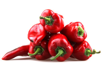 Red chilli peppers on white background.