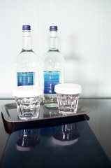 Still life with wine bottles and glasses