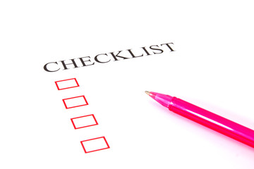 Checklist with pen and checked boxes.