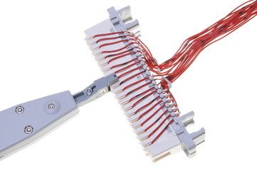 Telephone switchboard panel with punching tool